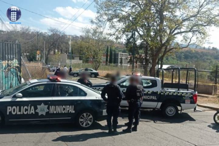 Hallan a 2 hombres ejecutados dentro de taxi en Morelia 